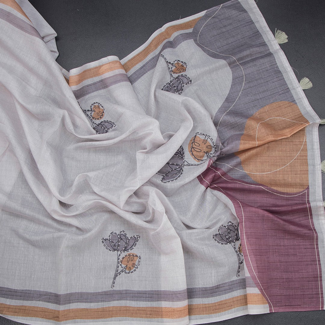 Grey semi linen saree with intricate grey thread work, crafted by Shriyara Life, displayed on a neutral background.