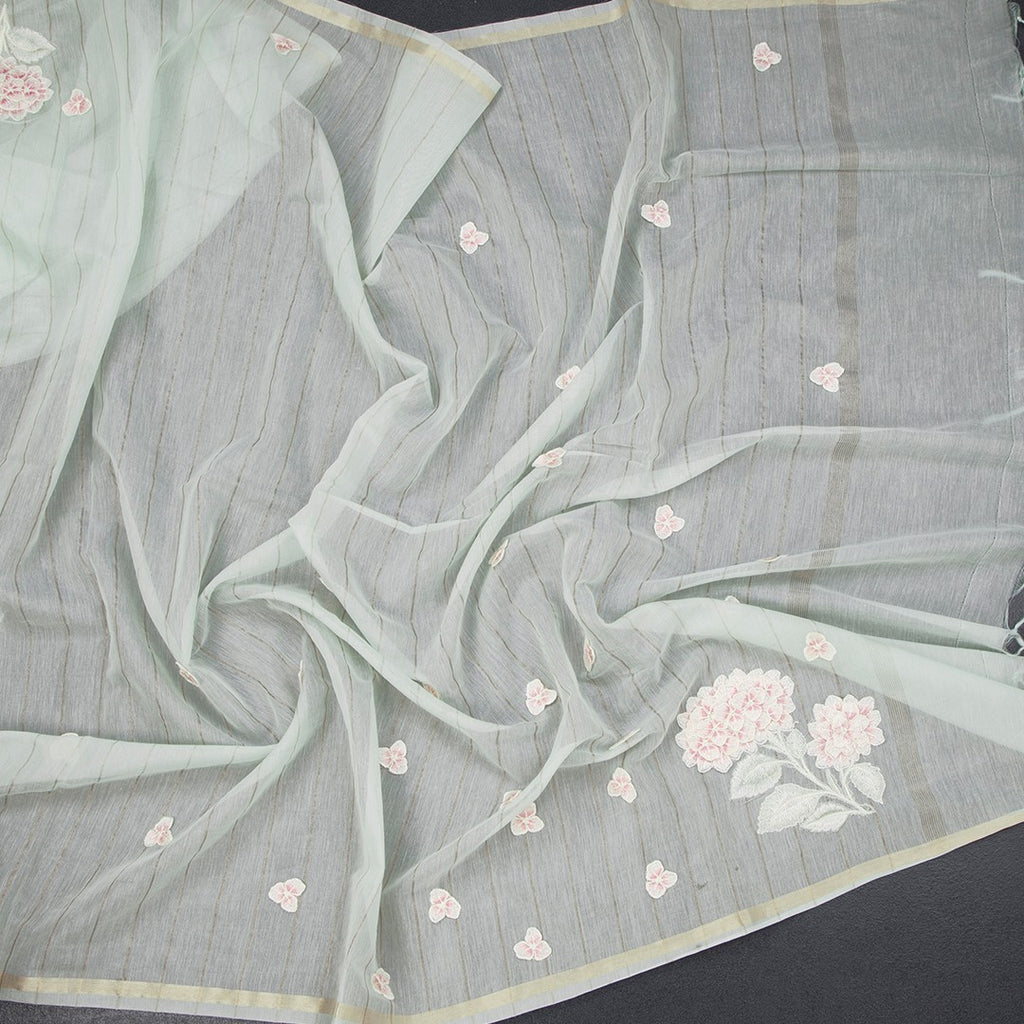 Raw silk mint green saree with floral thread work and striped pattern from Shriyara Life.