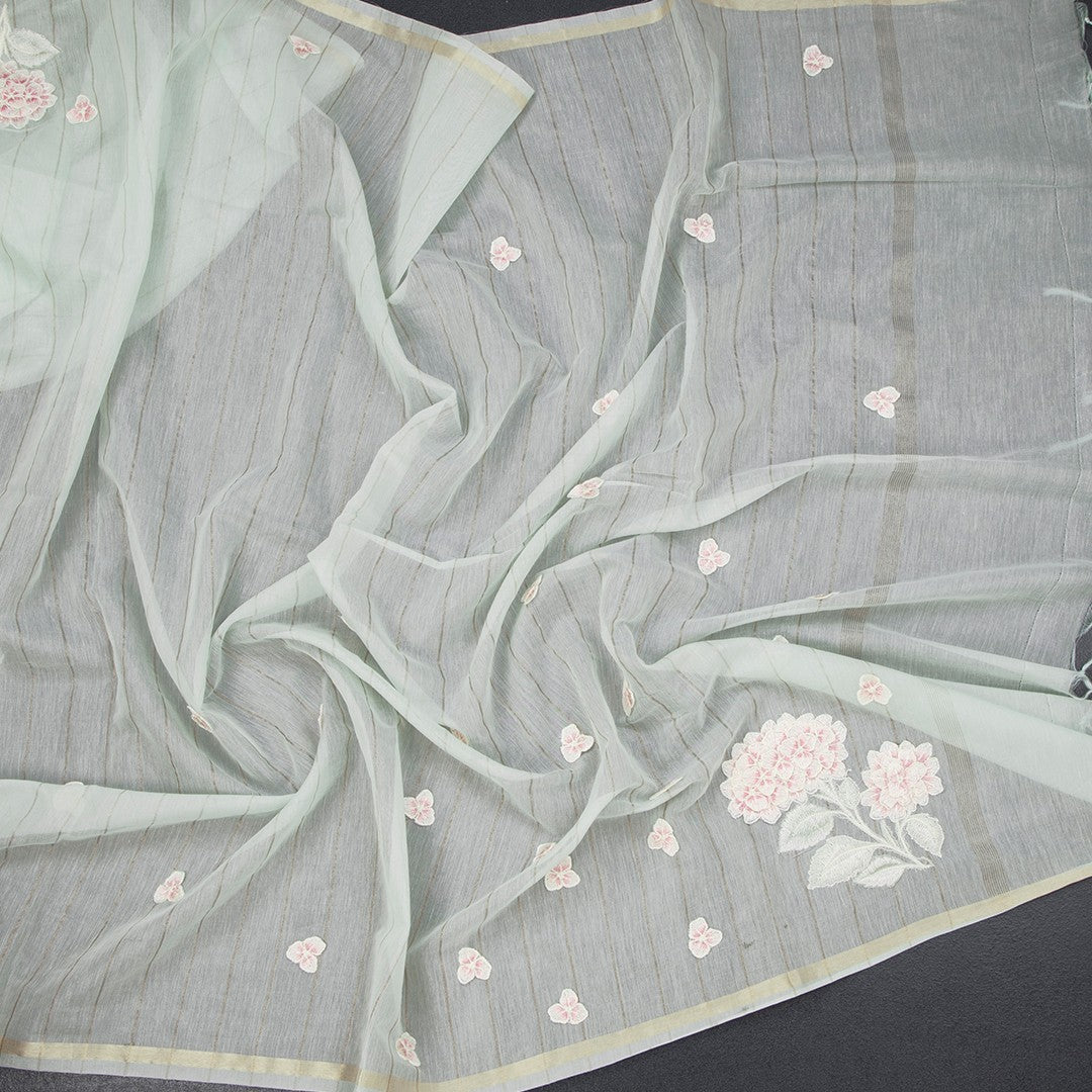 Raw silk mint green saree with floral thread work and striped pattern from Shriyara Life.