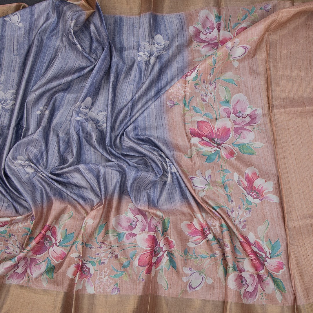 Raw silk saree with multicolor floral print from Shriyara Life, showcasing vibrant patterns and elegant drape.