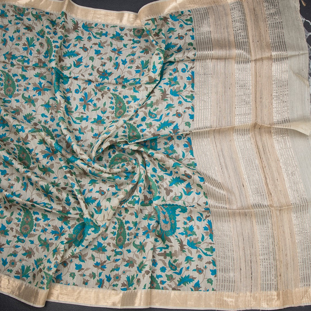 Pure Tussar cream saree with leaf print from Shriyara Life, featuring elegant traditional fabric and intricate design details.