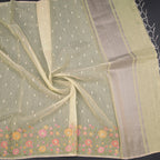 Light yellow Kota saree with intricate thread work from Shriyara Life, featuring traditional craftsmanship and elegant drape.