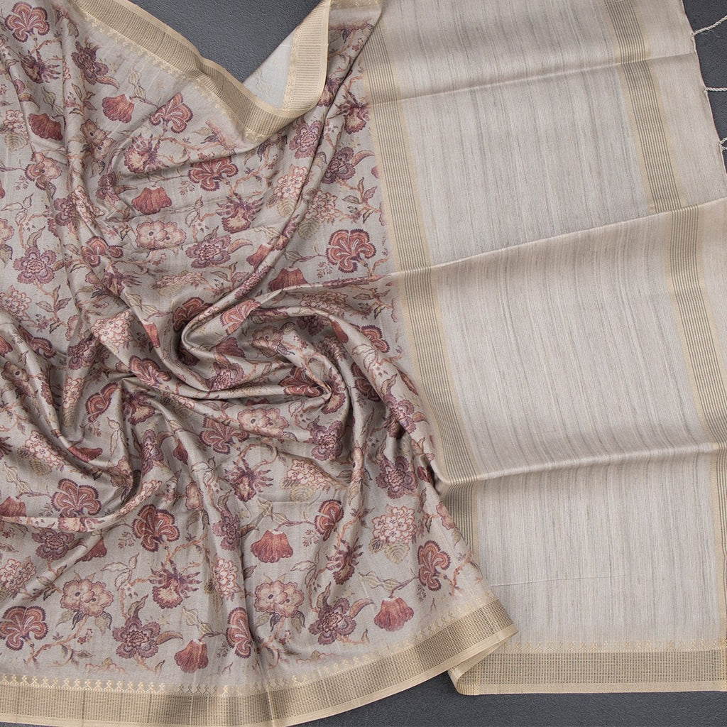 Raw silk grey floral printed saree by Shriyara Life showcasing intricate floral patterns and elegant drape.