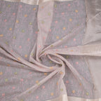 Light purple Kota saree with intricate thread work, displayed by Shriyara Life. Elegant traditional Indian attire.