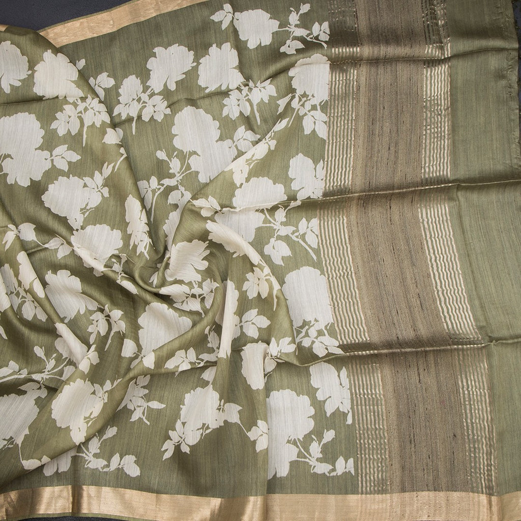 Pure Tussar Olive Green floral printed saree by Shriyara Life, showcasing intricate floral patterns and elegant drape.