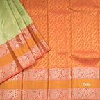 Light Green Self Designed Silk Saree With Orange Border And Gold And Silver Zari Work