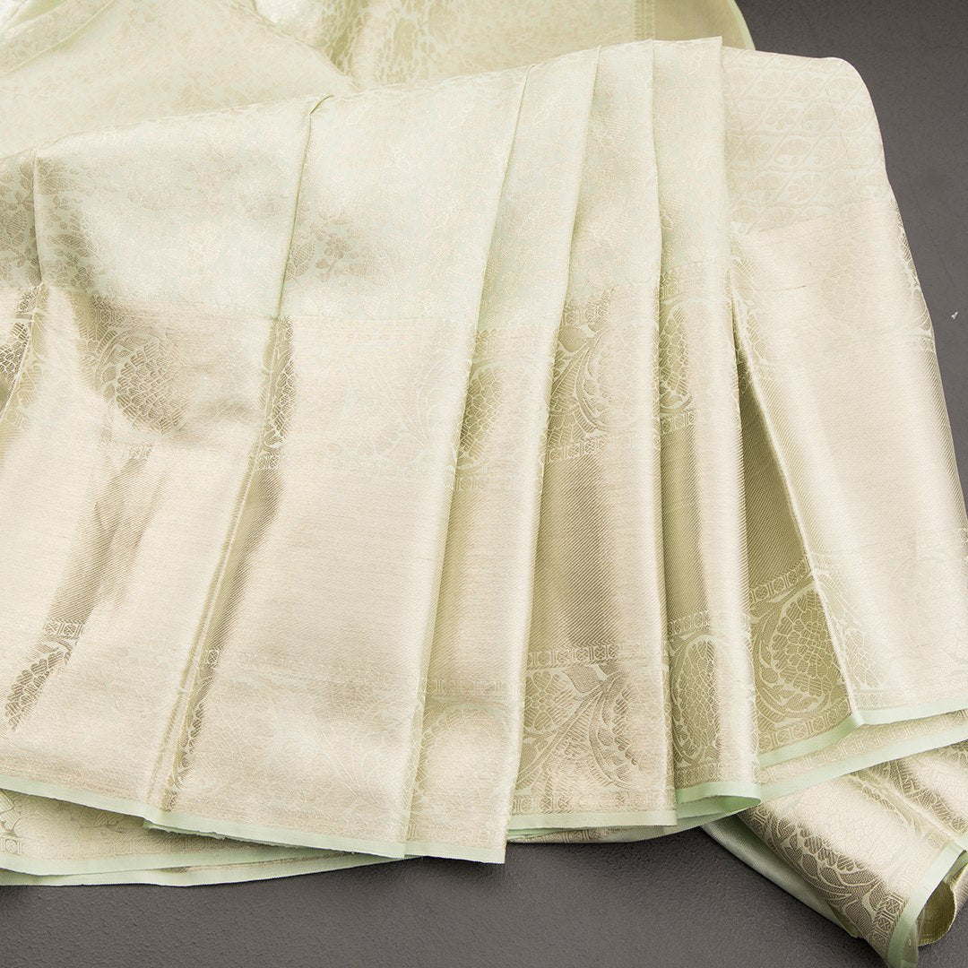 Light Green Brocade Silk Saree With Silver Zari Work