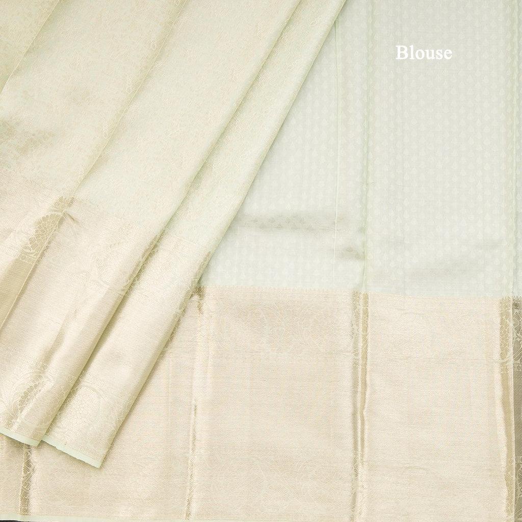 Light Green Brocade Silk Saree With Silver Zari Work