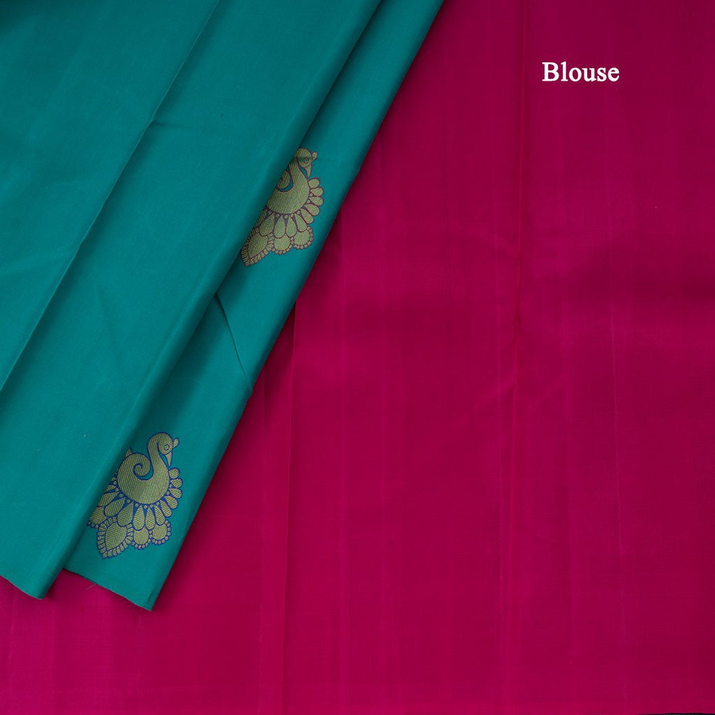 Borderless Turquoise Blue With Peacock Butta On Body With Contrast Pallu