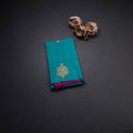 Borderless Turquoise Blue With Peacock Butta On Body With Contrast Pallu