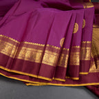 Magenta Silk Saree With Animal Motif On The Body And Zari With Thread Embossed Border