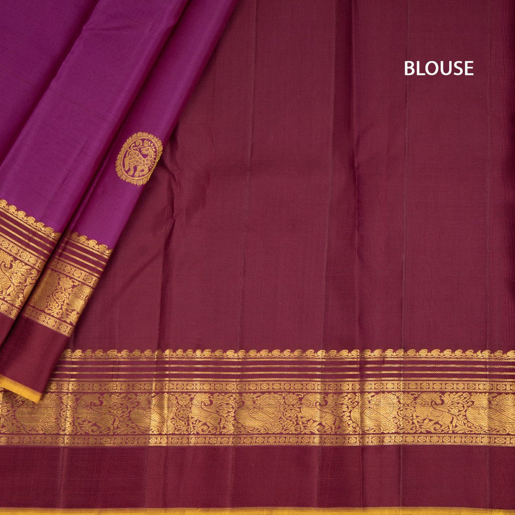 Magenta Silk Saree With Animal Motif On The Body And Zari With Thread Embossed Border