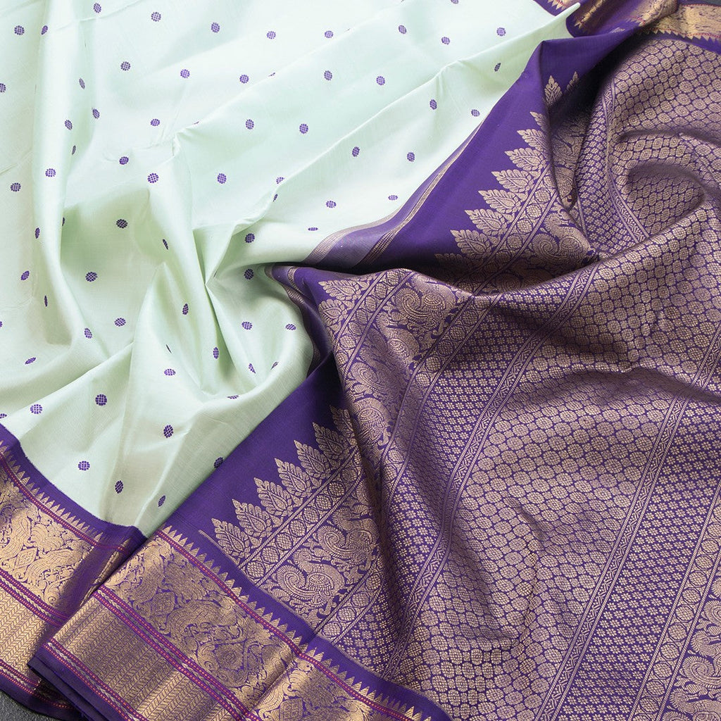 Pista Green Silk Saree With Thread Buttas And Temple Zari Border - Kumaran Silks