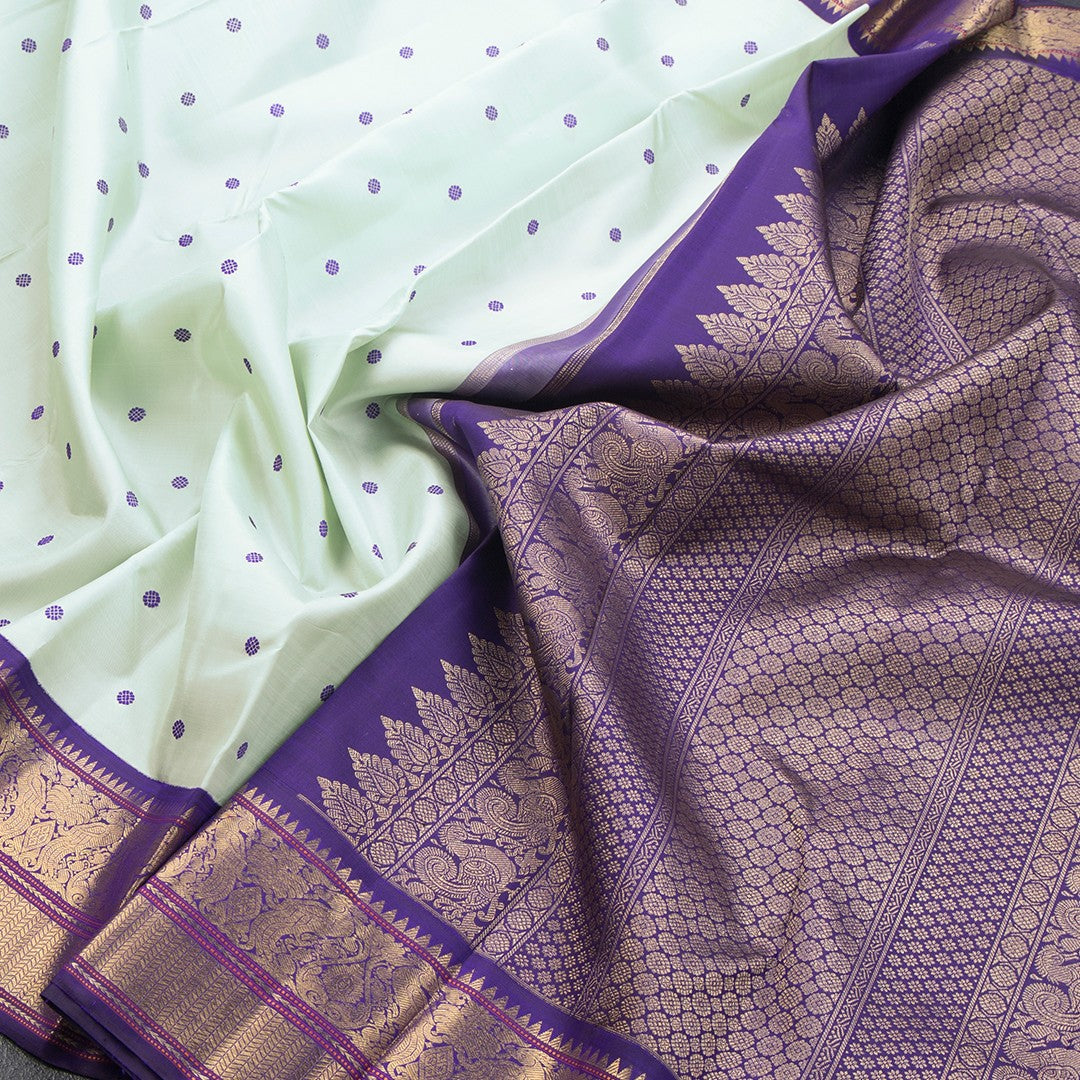 Pista Green Silk Saree With Thread Buttas And Temple Zari Border - Kumaran Silks