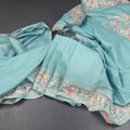 RTSR42264-Raw-Silk-Light-Blue-Saree-With-Zari-Buttas-And-Thread-Border-main