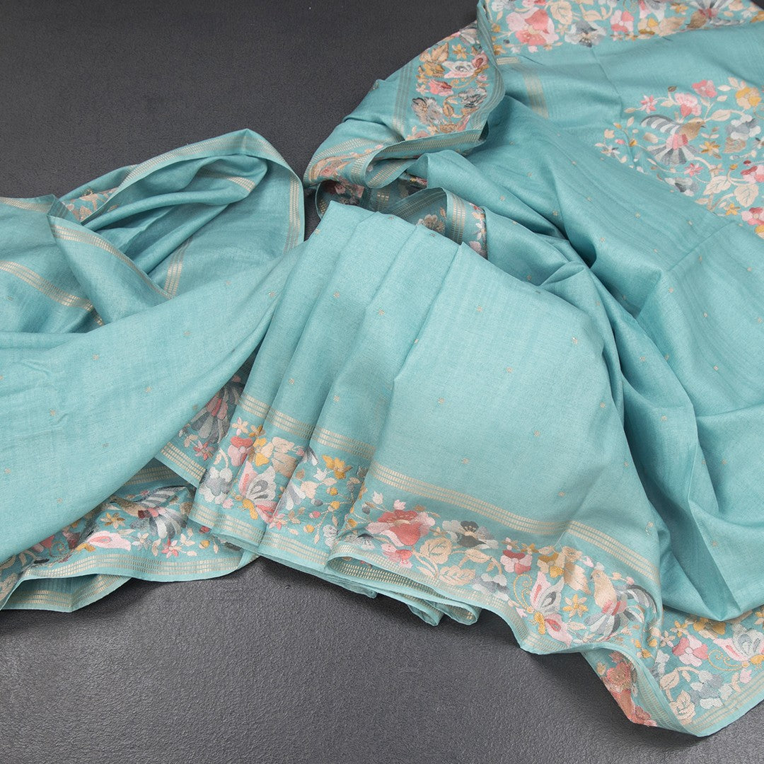 RTSR42264-Raw-Silk-Light-Blue-Saree-With-Zari-Buttas-And-Thread-Border-main