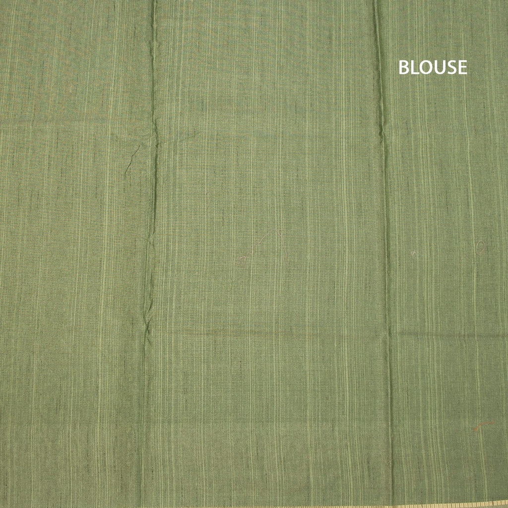 Pista green raw silk saree with zari checked pattern and thread border, paired with matching blouse from Shriyara Life.