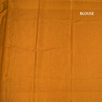 RTSR42307-3-Raw-Silk-Mango-Yellow-Saree-With-Zari-Buttas-And-Thread-Border-02-blouse
