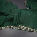 RTSR42331-Raw-Silk-Dark-Green-Saree-With-Zari-buttas-And-Thread-Border-main