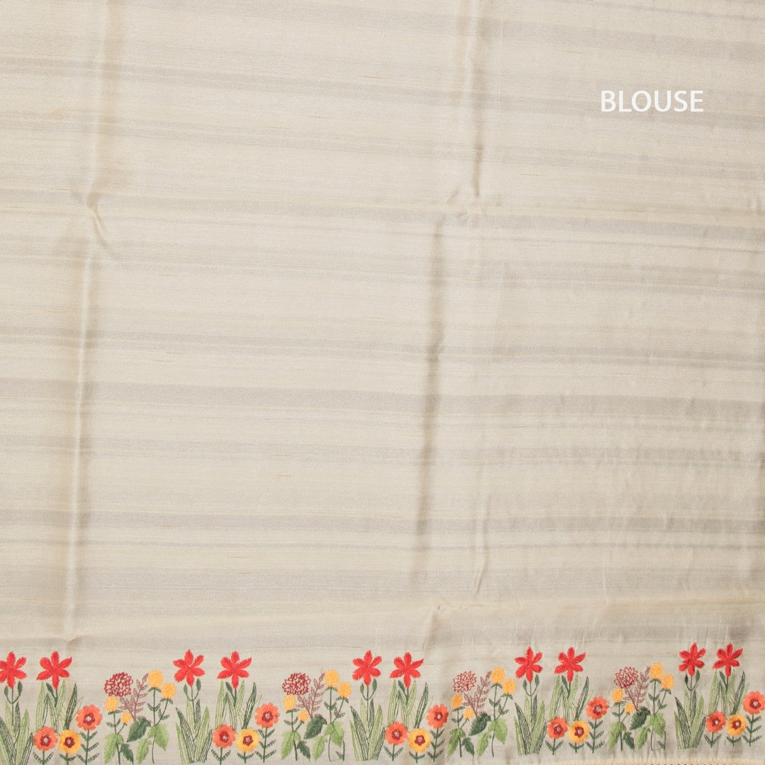 RTSR42339-3-Raw-Silk-Cream-Saree-With-Zari-buttas-And-Thread-Border-02-blouse