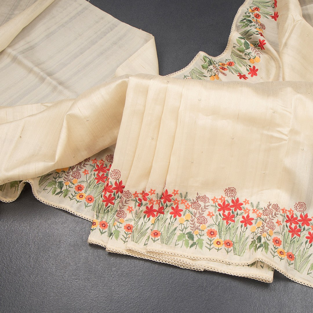 RTSR42339-Raw-Silk-Cream-Saree-With-Zari-buttas-And-Thread-Border-02-main
