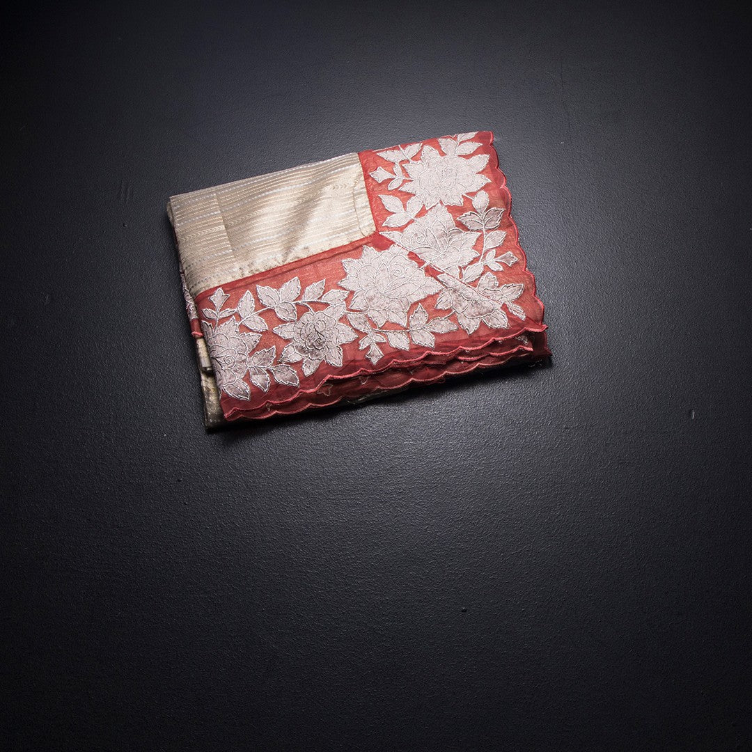 RTSR42360-1-Tissue-Cream-Zari-Stripes-Saree-And-Floral-Border-fold