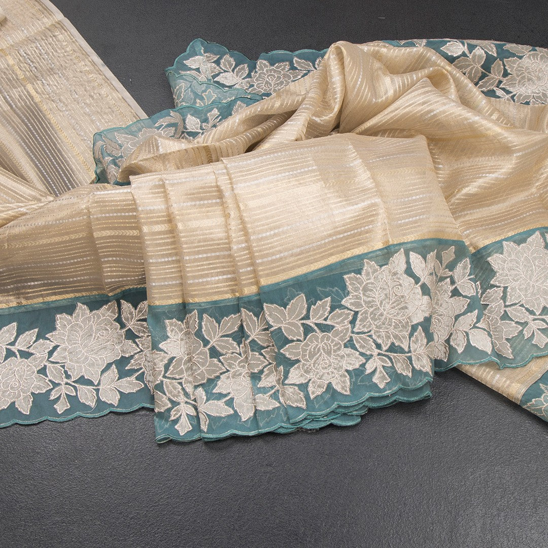 RTSR42362-Tissue-Cream-Zari-Stripes-Saree-And-Floral-Border-03-main