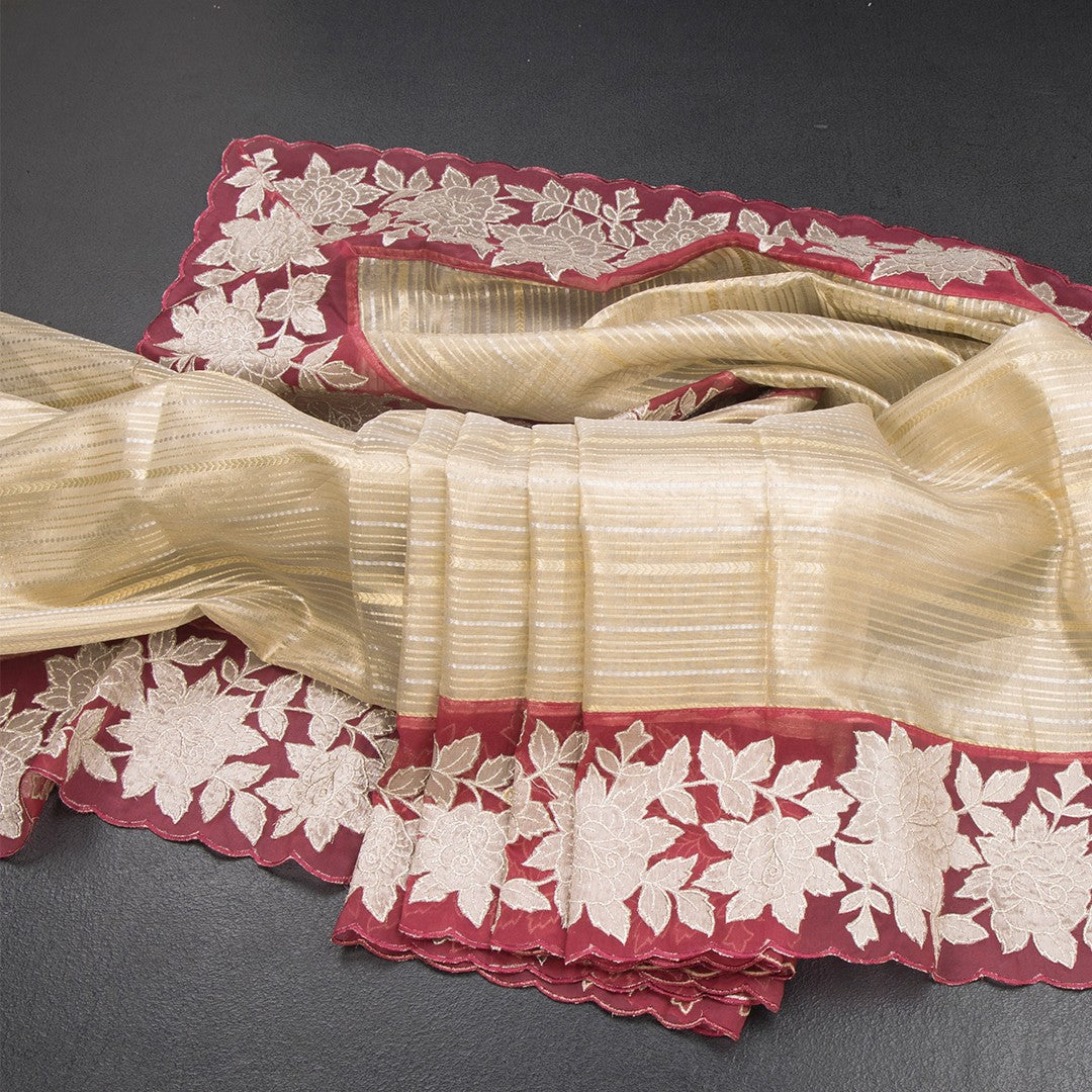 RTSR42363-Tissue-Cream-Zari-Stripes-Saree-And-Floral-Border-04-main