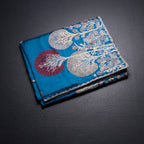 RTSR42373-1-Raw-Silk-Peacock-Blue-Zari-Worked-Saree-In-Tree-Design-fold