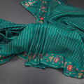 RTSR42383-Raw-Silk-Peacock-Green-Zari-Stripes-Saree-And-Thread-Border-main